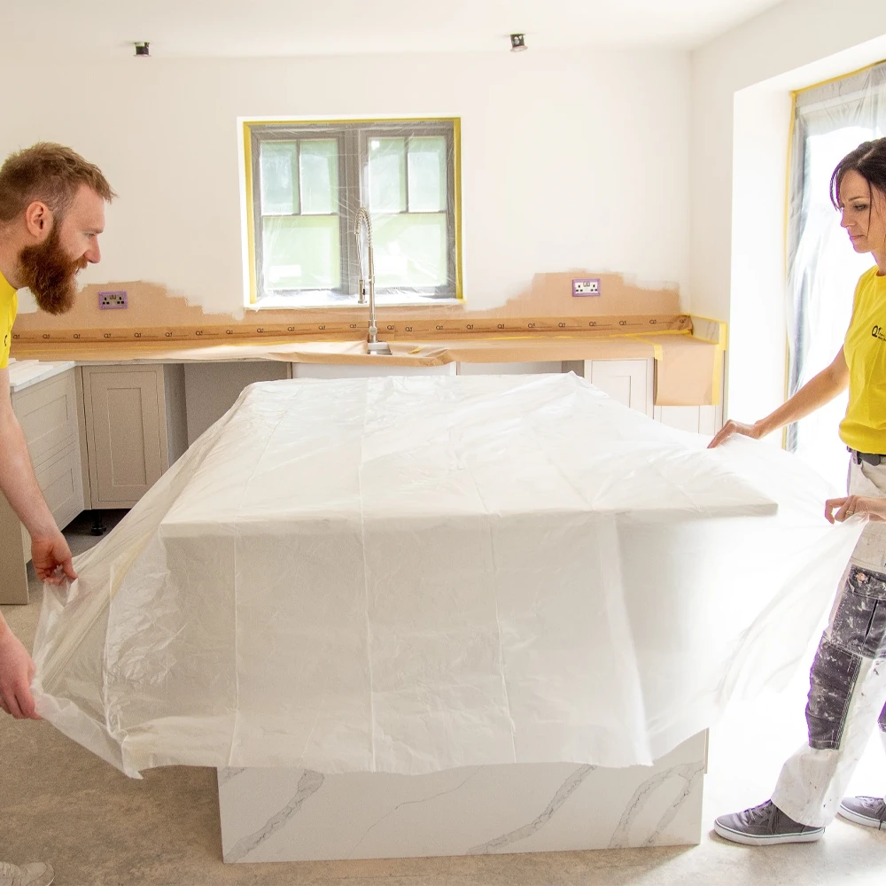 4. Folded Plastic Sheet Masking Film for Table Protection.webp